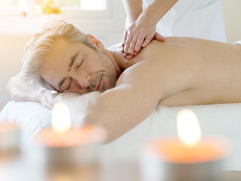 Massage at a man, symbol image for WellnessHotel in Oberhof ©goodluz - stock.adobe.com