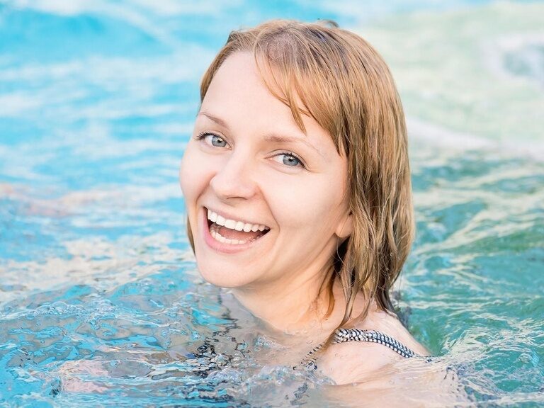 Woman in swimming pool, symbol picture Wellness Hotel Oberhof